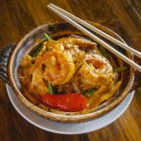 Thai Casserole · Thai red curry coconut with basil chicken and shrimp. Spicy.