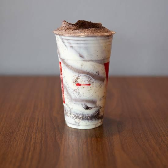 Cookie Monster · Creamy cookies and cream shake with signature CAMO cheesecake brûlée and a sprinkle of crushed Oreos