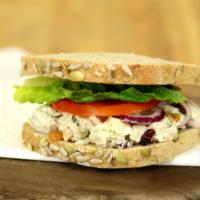 Chicken Berry Pecan Sandwich · Chicken salad made with chicken breast, seasoned roasted
pecans & cranberries on our Honey W...