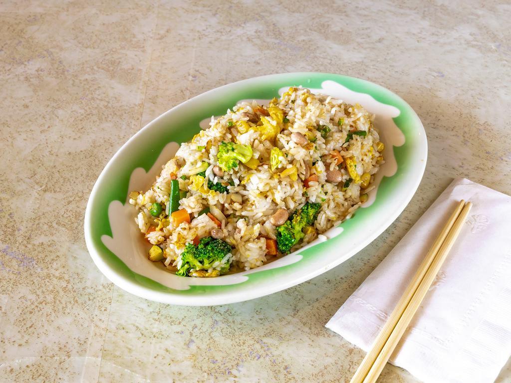 Vegetable Fried Rice 야채볶음밥 · Fried rice with assorted vegetables and egg.