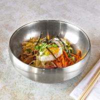 Vegetable Bibimbab 야채비빔밥 · Steamed rice served with vegetables and egg.