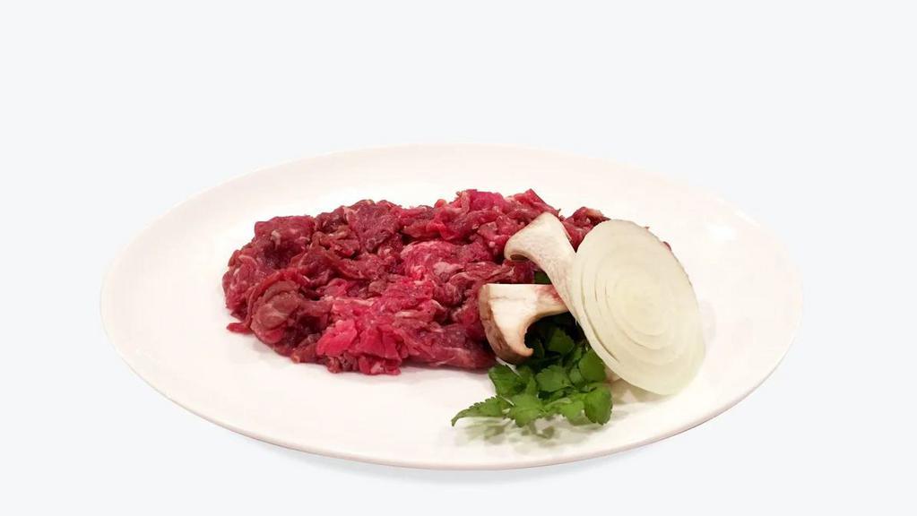 Bul Go Gi 불고기 · Marinated thin sliced prime beef.