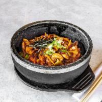 Baby Octopus Dolsot Bi Bim Bap 쭈꾸미곱돌 비빔밥 · Rice topped with vegetables, baby octopus, and egg.
