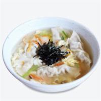 Dumpling Soup 만두국 · 8 pieces of dumplings and glass noodles in beef broth.