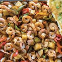 World Famous Shrimp Tray · Grilled shrimp, Sliced bell peppers, tomatoes, onions, and potatoes in our signature spices....