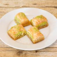 Baklava · Rich, perfectly sweetened thin layers of phyllo filled with finely chopped pistachios, held ...