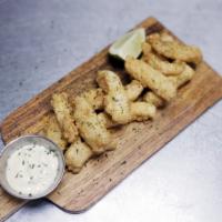 Deditos de Bacalao · Fried cod fish fingers.