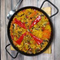 Paella Vegetales · Traditional Spanish veggie paella with vegetables of the season.