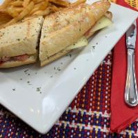 La Segunda Sandwich · Aged serrano ham, Manchego cheese, slice tomato and olive oil.