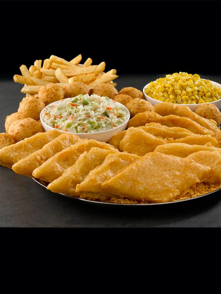 12 Piece Fish or Chicken Meal · 12 pieces of Fish or Chicken, hand-battered in our signature recipe, served with 3 Family Size Sides and 12 Hushpuppies.