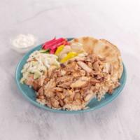 Chicken Shawerma Plate · Marinated and flame broiled chicken served with french fries or rice, salad, hummus, garlic ...