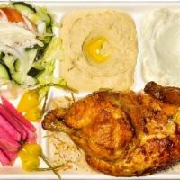 1/2 Chicken Plate · 1 half rotisserie chicken served with french fries or rice, salad, hummus, garlic sauce, pic...