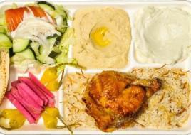 Quarter Dark Plate · Rotisserie chicken thigh and leg, served with french fries or rice, salad, hummus, garlic sa...