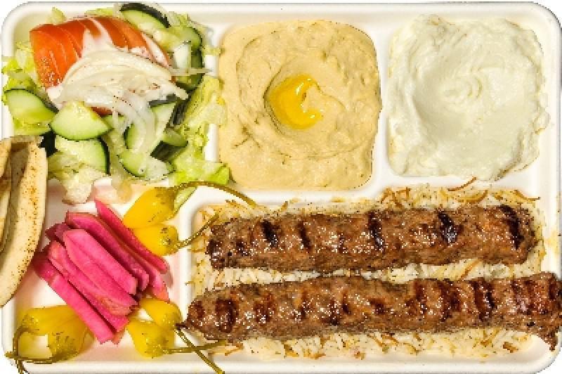 Lule Kabob Plate · Ground beef kabob served with french fries or rice, salad, hummus, garlic sauce, pickles and 2 pieces of pita bread.
