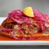 Torta Ahogada · Drowned sandwich, typical from Guadalajara this tomato sauce soaked sandwich is filled with ...