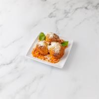 Arancini · Riceballs, peas and mozzarella.
