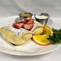 Blintzes · 2 rolled crepes filled with cheese, cherries or apples.