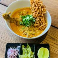 Royal Kao-Soi · Crispy egg noodles and a fresh kao-soi coconut milk reduction curry paste served over a chic...