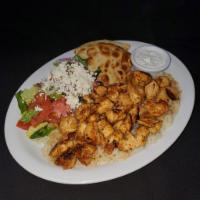 Chicken Gyro Platter · Thinly sliced and spit roasted marinated chicken. Served with rice, Greek salad, pita, and t...