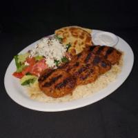Adana Kebab · Seasoned ground spicy lamb kebab.
