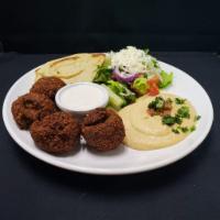 Falafel Platter · Deep fried patties of fava beans, chickpeas, onion, and parsley. Served with Greek salad, hu...