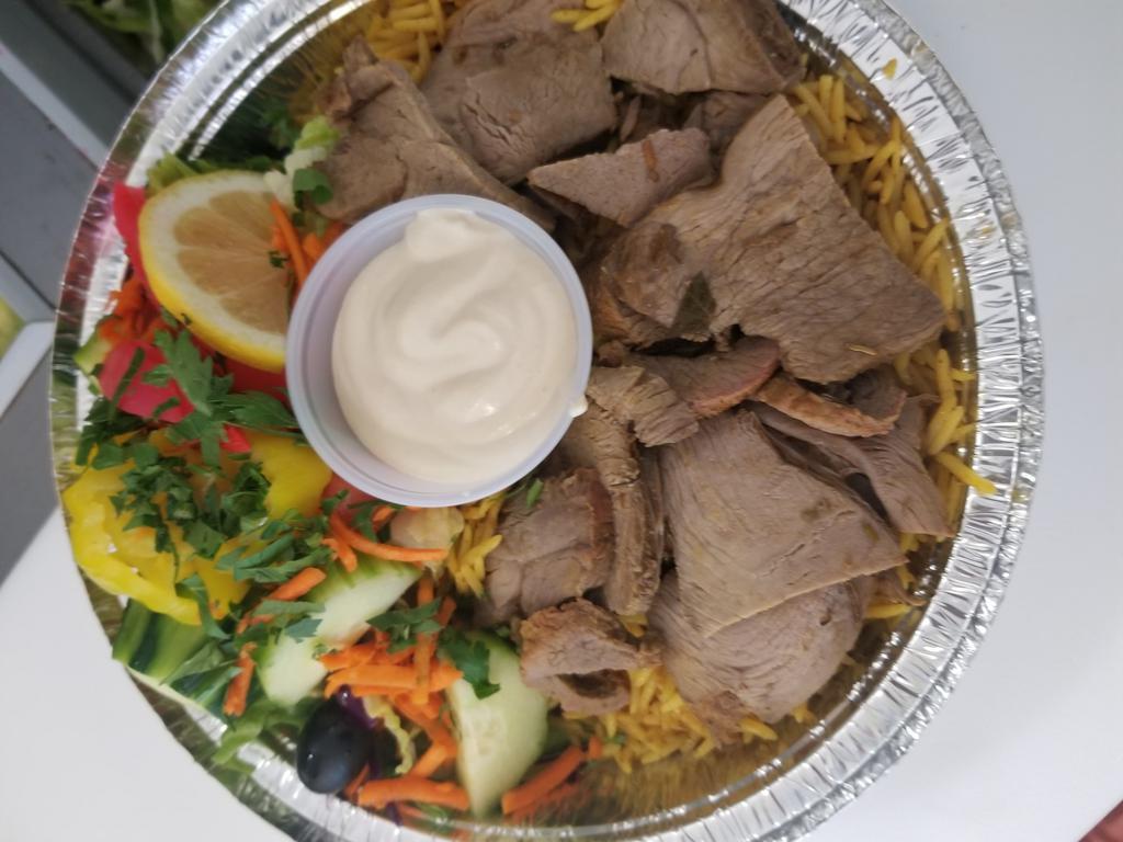 Lamb Shawarma Bowl  · Tender and tasty . leg of lamb in middle eastern spices roasted and carved 