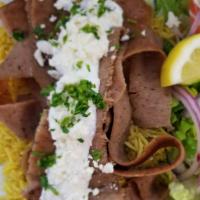 Gyro Plate · Gyro meat, tzatziki sauce and feta cheese.served with rice and  salad