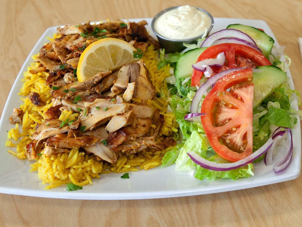 Chicken Shawarma Plate · Chicken shawarma meat and Garlic  sauce. served with rice and salad