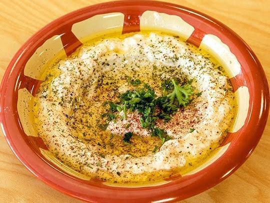 Hummus     bel la hmameh         ( Hummus toped with gyro meat or chicken ) · hummus topped with your choice of meat . served with fresh pita