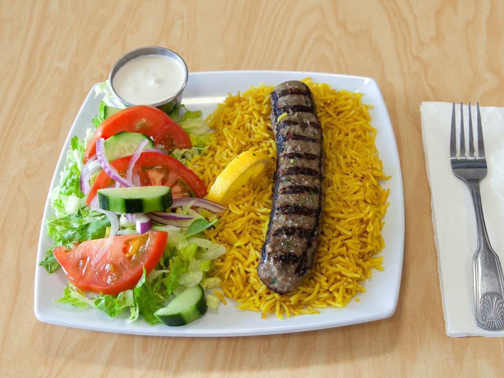 Kafta Kabob Plate(2) · Kafta kabob and tahini sauce.served with rice and salad