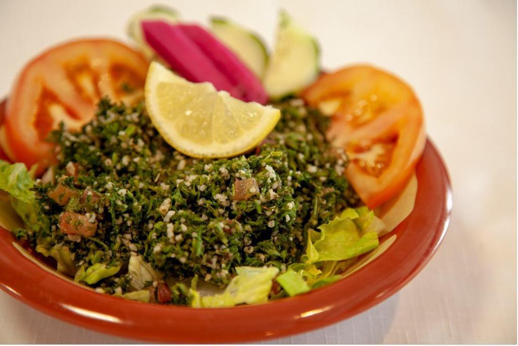 Tabbouleh Salad ( Gluten free) · Parsley, cracked wheat, green onion, tomato, mint, lemon and olive oil.