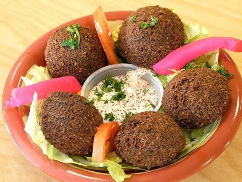Falafel with Tahini Sauce · Ground chickpeas with onions and parsley. Gluten free.