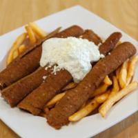 Loaded with Gyro and Tzatziki · Basket of Fries loaded with Gyro Meat Topped with tzatziki sauce and Feta cheese
