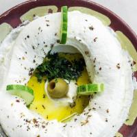 Side labneh · Thick Greek yogurt garnished with Zaatar and olive oil
