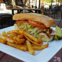Pesto Chicken Sandwich · Chicken, bacon, swiss cheese, lettuce, tomatoes, and pesto mayo served on a hoagie roll. 