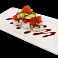 Poke Roll · Raw, fresh, and spicy. Inside: Spicy tuna, cucumber, Outside: Specially marinated spicy poke...