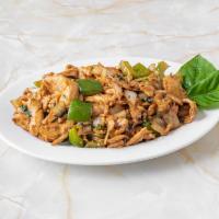 Basil Chicken · Chicken stir-fried w/ green pepper, onion, basil and Thai peppers in a spicy sauce.