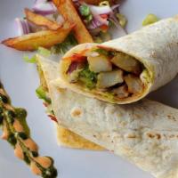 Aloo Roll · Potato with vegetables wrapped in a flour tortilla and a side Salad