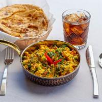 Punjabi Mater Paneer Bhurjee · Spicy scramble of Indian cheese and English peas. Vegetarian.