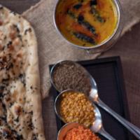 Toor Masur Double Tadka Dal · Homestyle yellow lentils with tamarind. Vegetarian.