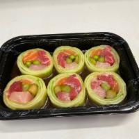 Naruto · Raw. Tuna, salmon, yellowtail, asparagus, and masago wrapped in cucumber served with ponzu s...