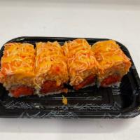 Sexy Girl Roll · Spicy tuna, topped with spicy crab, spicy mayo tempura flakes. Raw.