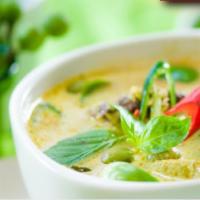 41. Green Curry · Sliced bamboo shoots, bell peppers, kaffir lime leaves and basil leaves prepared in coconut ...