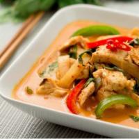 42. Red Curry · Sliced bamboo shoots, bell peppers, kaffir lime leaves and basil leave prepared in coconut m...