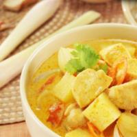 43. Yellow Curry · Potatoes, onions, and carrots prepared in coconut milk and yellow curry paste.