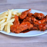 Combo 3 · 1/2 lb. of boneless wings, 8 bone-in wings, regular fries, and two drinks. Ranch or bleu che...