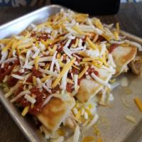 Enchiladas · caramelized peppers and onions, blended Mexican cheeses, and choice of chicken, pork, and st...