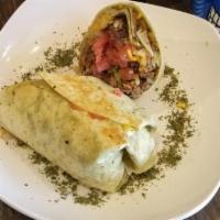 Gringo Burrito · Flour tortilla loaded with seasoned beef, rice, refried beans, Pico de Gallo, lettuce, cilan...