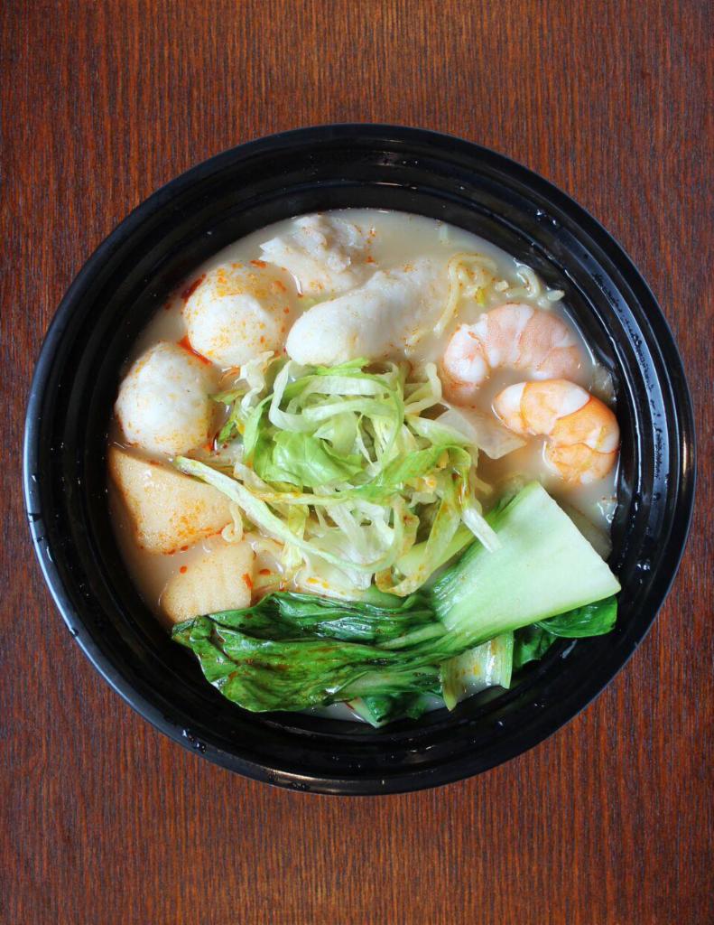 Seafood Ramen · Ramen noodle soup with shrimp, fish ball, fish tofu, fish slices and vegetable in Pork bone broth. ( Vegetarian broth available upon request )
