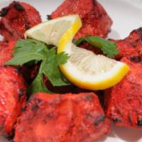 Tandoori Chicken Boti Boneless 6 pieces · Diced tender boneless chicken, marinated in spices, herbs and yogurt, roasted in a clay oven...